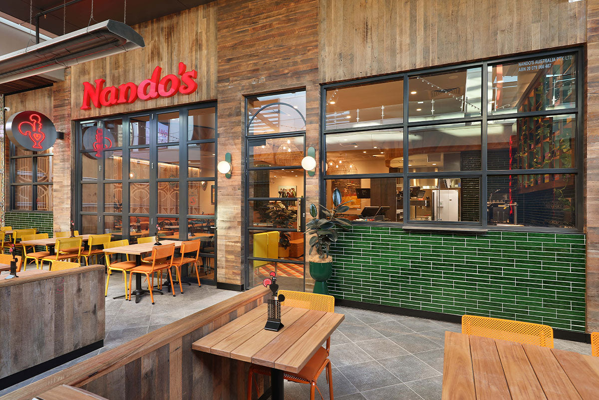 Inviting and Warm: Nando's Werribee by Construction Zone